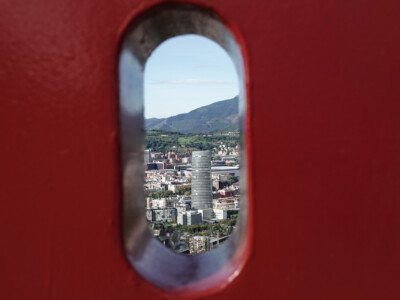 View of Bilbao through the "BILBAO" sign at Mirador de Artxanda, BIlbao, Spain, 2024