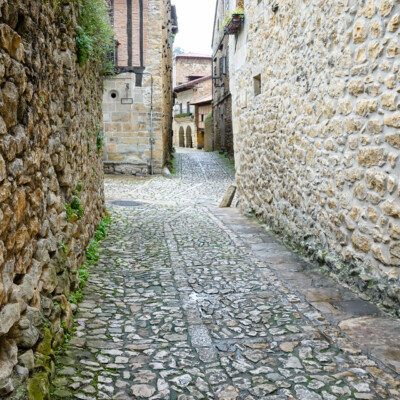 Cobblestone and brick in Santillana del Mar, Spain.