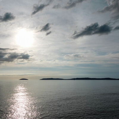 Looking west from the coast of Spain at the Atlantic Islands of Galicia National Park.